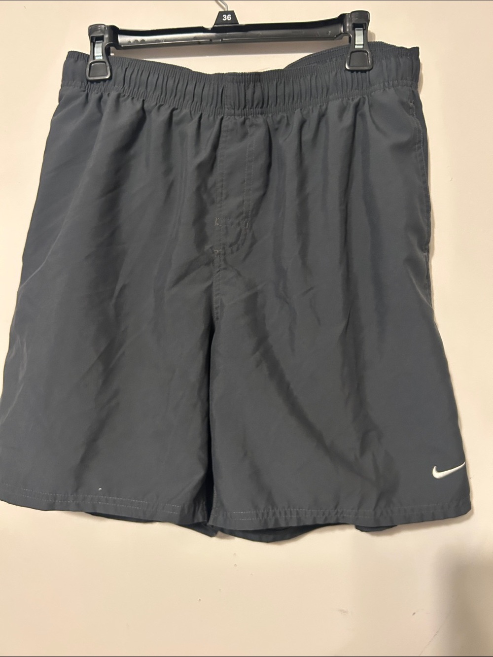 3 pairs of Nike Men’s swim trunks or everyday wear